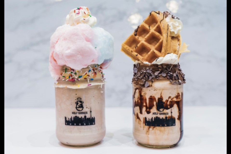 The Cotton Candy Freakshake and the Nutella Lovers Waffle Freakshake available at Holy Shakes.