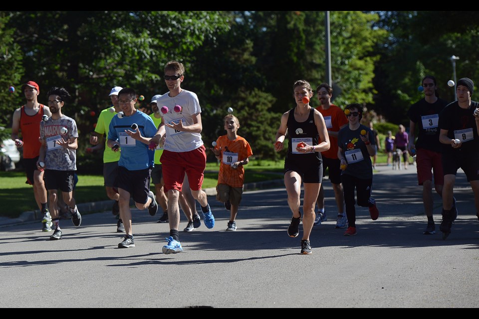 And they're off! The Guelph 5k Joggling Championship gets underway Saturday, June 24, 2017, on Oak Street. Tony Saxon/GuelphToday