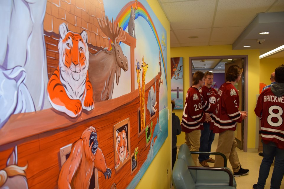 Guelph Storm players mill about the Smilezone at Guelph General. Rob O'Flanagan/GuelphToday