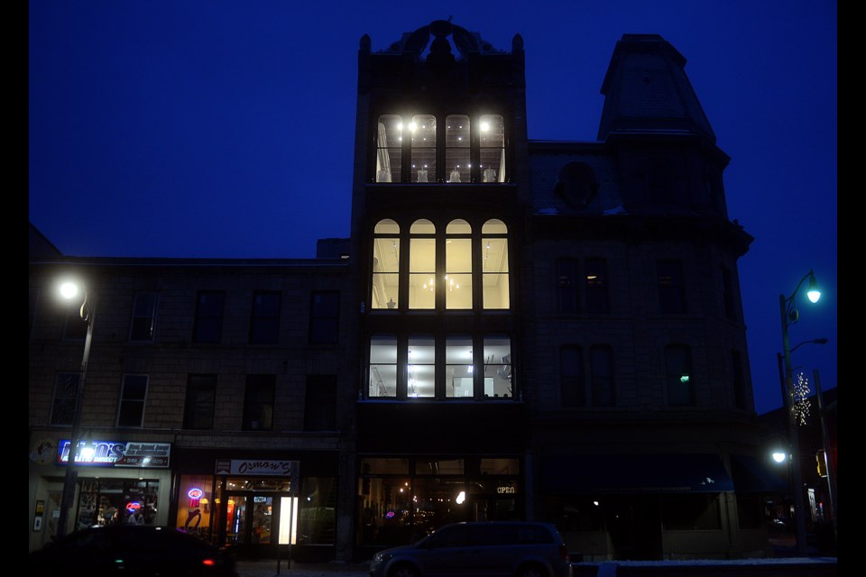 The 130-year-old newly renovated Petrie Building on Wyndham Street glows Tuesday, Jan. 16, 2018, after having all the scaffolding removed after over a year. Tony Saxon/GuelphToday