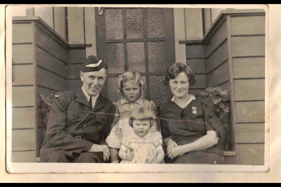Wendy Gruner, front, and her sister Robin sit with their parents Arthur and Enid shortly before her father left for the war. Submitted photo