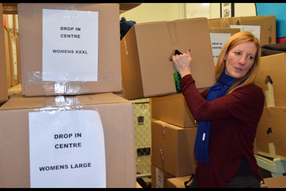 Gail Hoekstra, executive director of Welcome In Drop-In Centre passed out gift boxes to guests on Christmas Day. Rob O'Flanagan/GuelphToday