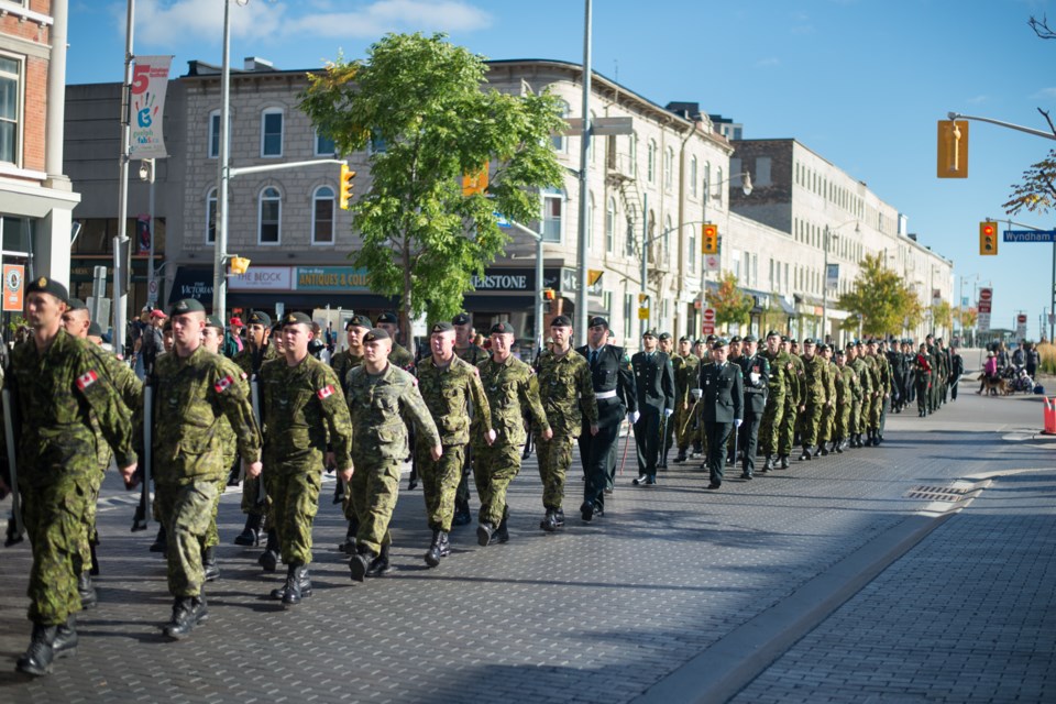 Members of the 11th Field Regiment, RCA march onto Carden St in front of Old City Hall during their Freedom of the City parade for their 150th Anniversary of Artillery of Guelph celebration. Photo by Cara Chapman