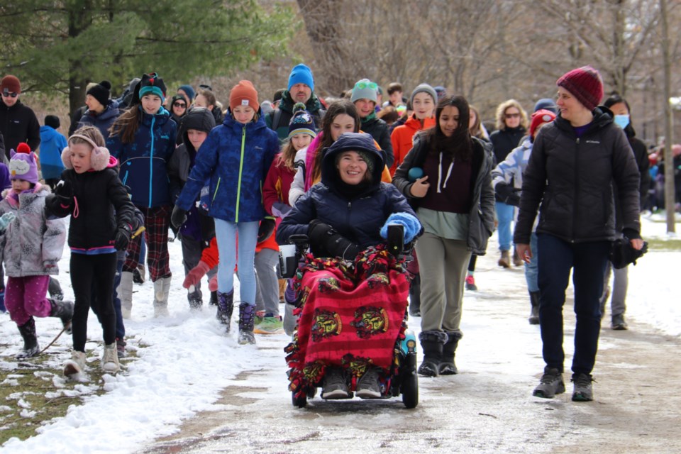Hundreds of community members showed their support for the Guelph teacher by joining her for a walk/roll around the river during the fundraiser.  