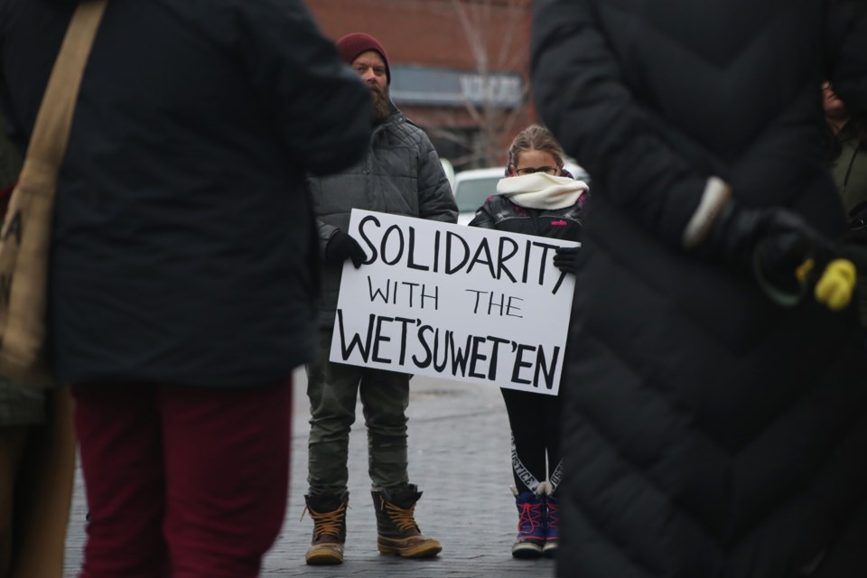Protesters rallied outside Guelph City Hall on Sunday evening to stand in solidarity with the Wet’suwet’en hereditary chiefs who are currently fighting construction of a pipeline proposed to be built within their unceded territory located within British Columbia. Kenneth Armstrong/GuelphToday