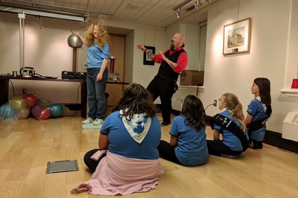 Girl Guides learning about electricity during STEM Week in 2018 with Royal City Science co-founder, Orbax.