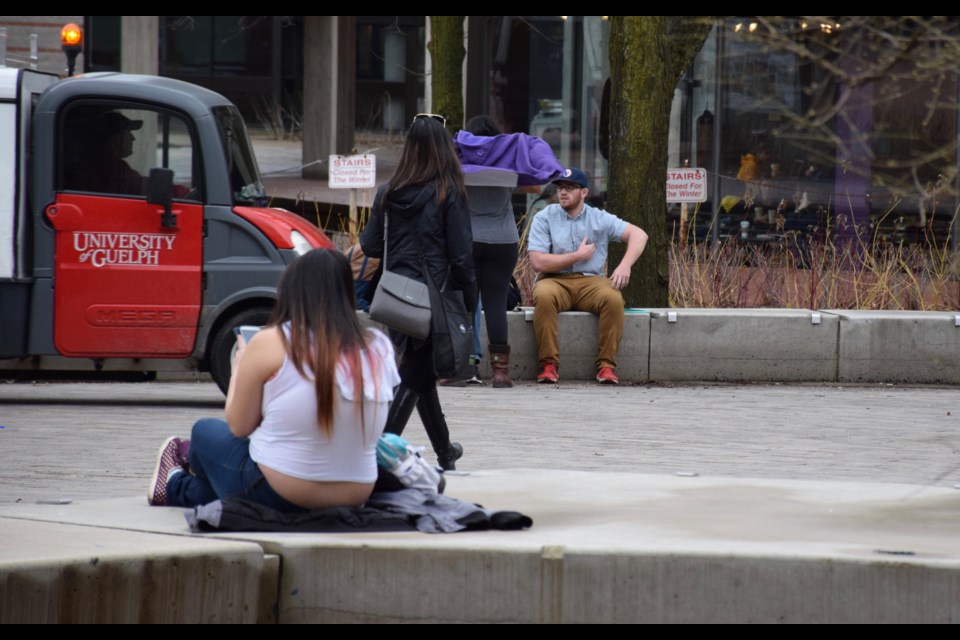 Short sleeves and outdoor studies on campus. Rob O'Flanagan/GuelphToday