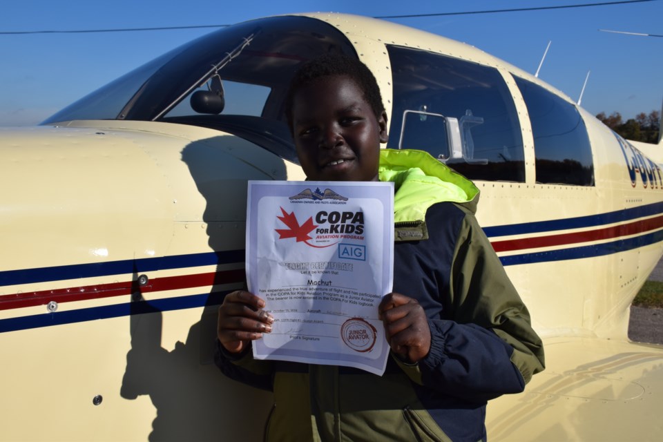 Machut Apach, 10, with his COPA Flight 1 certificate. Rob O'Flanagan/GuelphToday