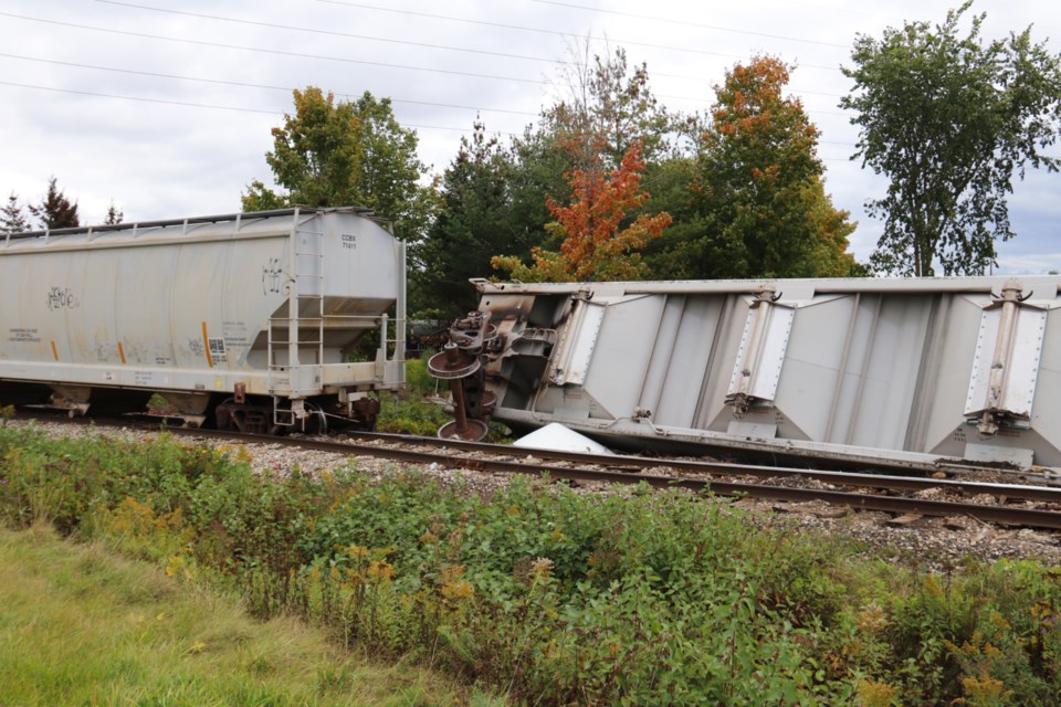 Two derailed train cars on a Guelph Junction Railway Track in the north end off Dawson Road. 