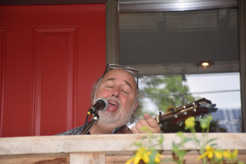 Dan McLean Jr. pours out the soul on a front porch. (Rob O'Flanagan/GuelphToday)