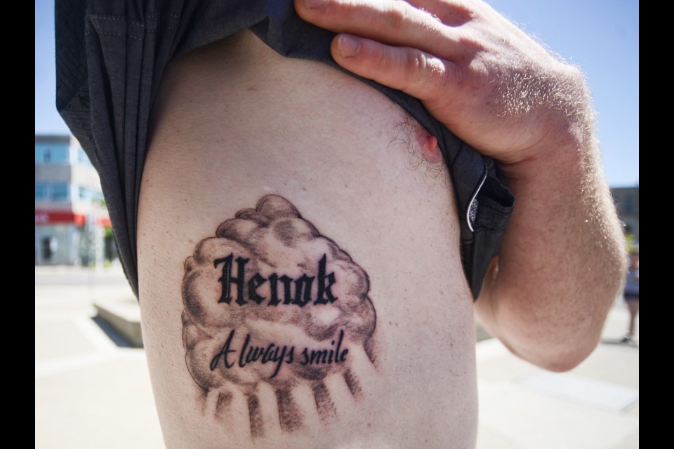 Steffan Potts sports a fresh tattoo in memory of his friend Henok Getahun, who died of an overdose last week. Tony Saxon/GuelphToday