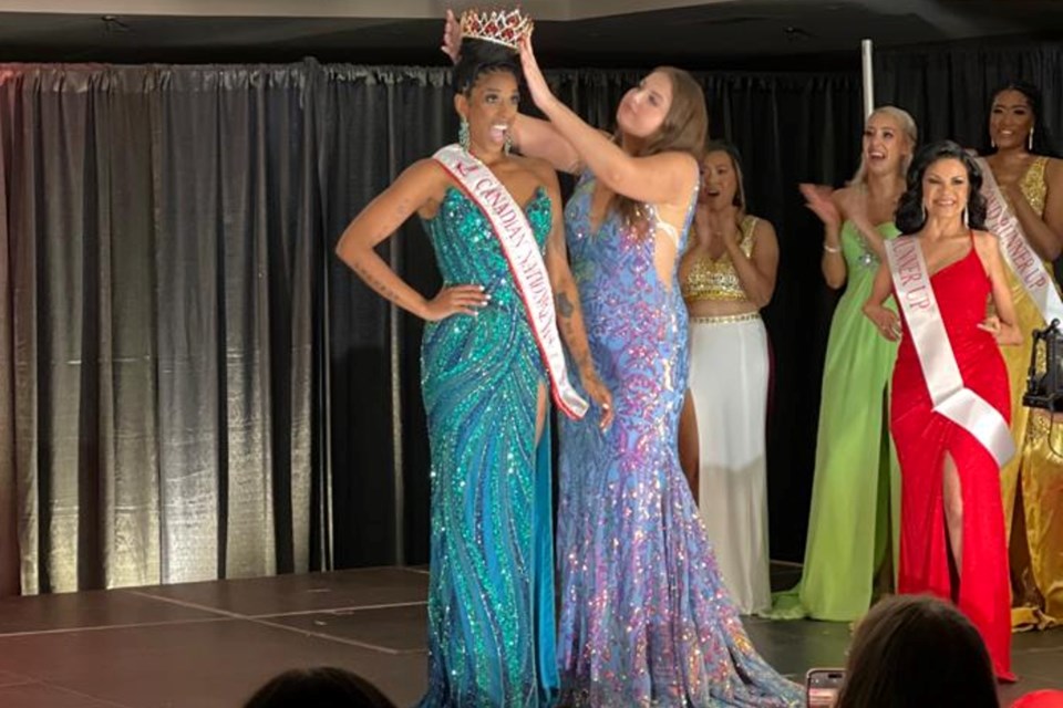 Kween being crowned queen at the Canadian National Miss pageant. 