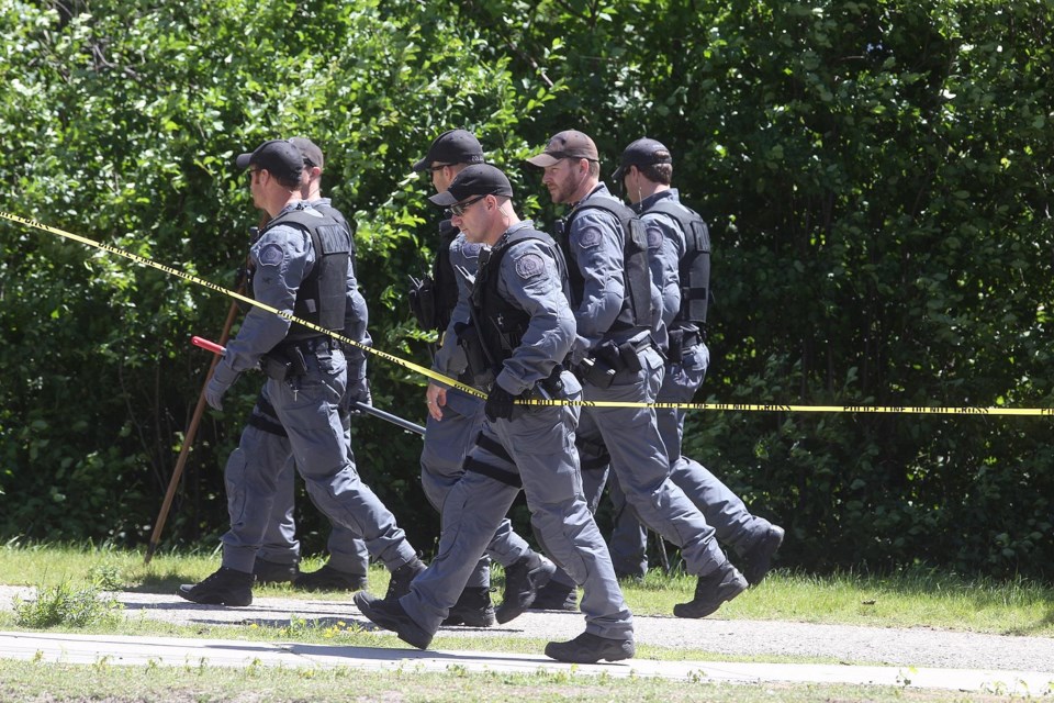 Police search in the area of Arthur Street and Wellington Street Thursday after a body was pulled from the Speed River Wednesday night. Kenneth Armstrong/GuelphToday