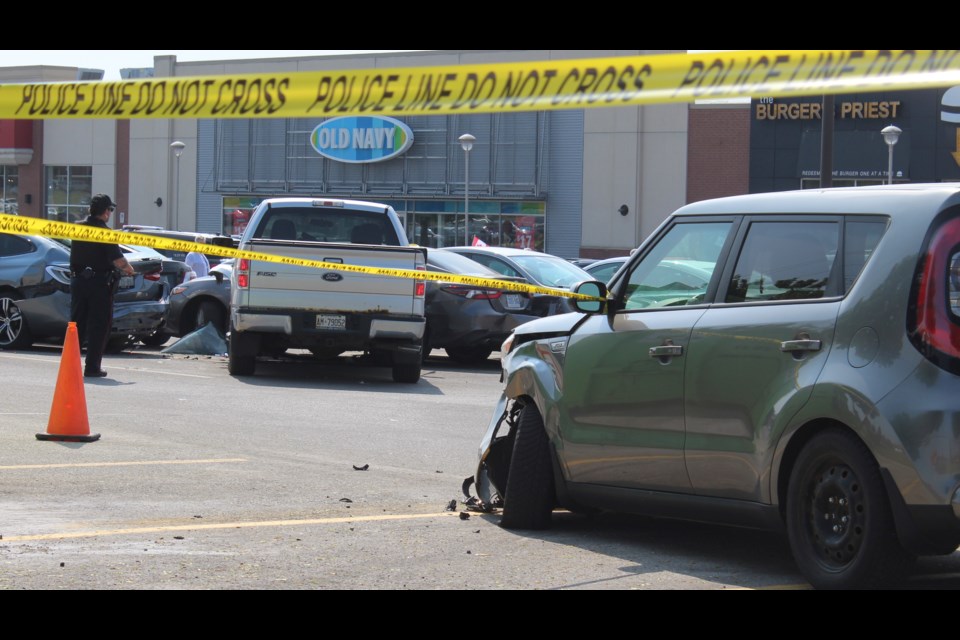 The crash scene at Stone Road Mall Thursday afternoon following a medical incident that killed a driver.
