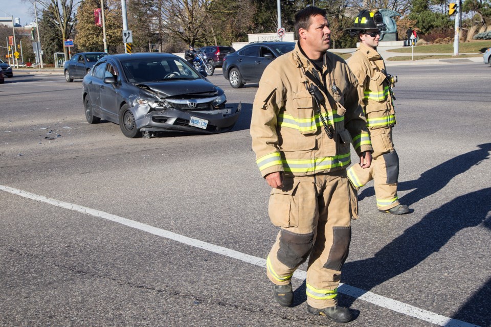 Firefighters on the scene of a collision Tuesday afternoon on Gordon St. at Stone Rd. Kenneth Armstorng/GuelphToday