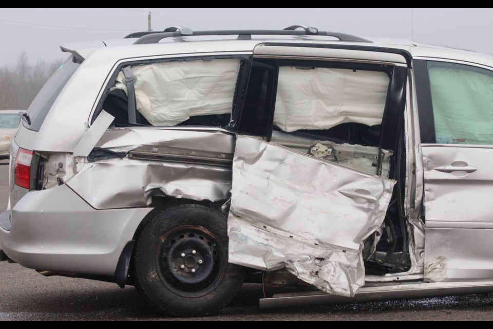 A van sustained extensive damage after a two-vehicle crash on Highway 7 Wednesday morning.
