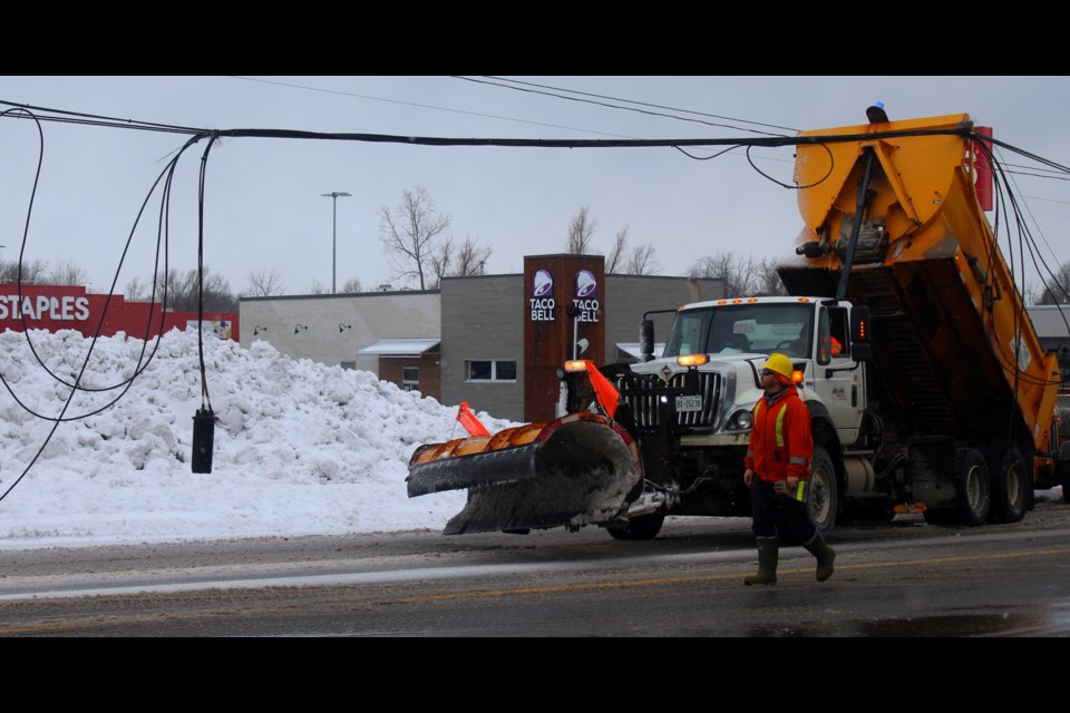 A dump truck knocked over some power lines near Woodlawn and Woolwich, resulting in a road closure Saturday afternoon.