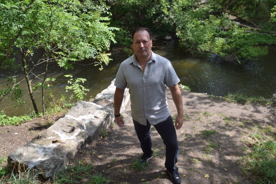 Paul Lalonde and his dog ventured down to the Speed River at Goldie Mill recently, only to find discarded drug paraphernalia. (Rob O'Flanagan/GuelphMercury)