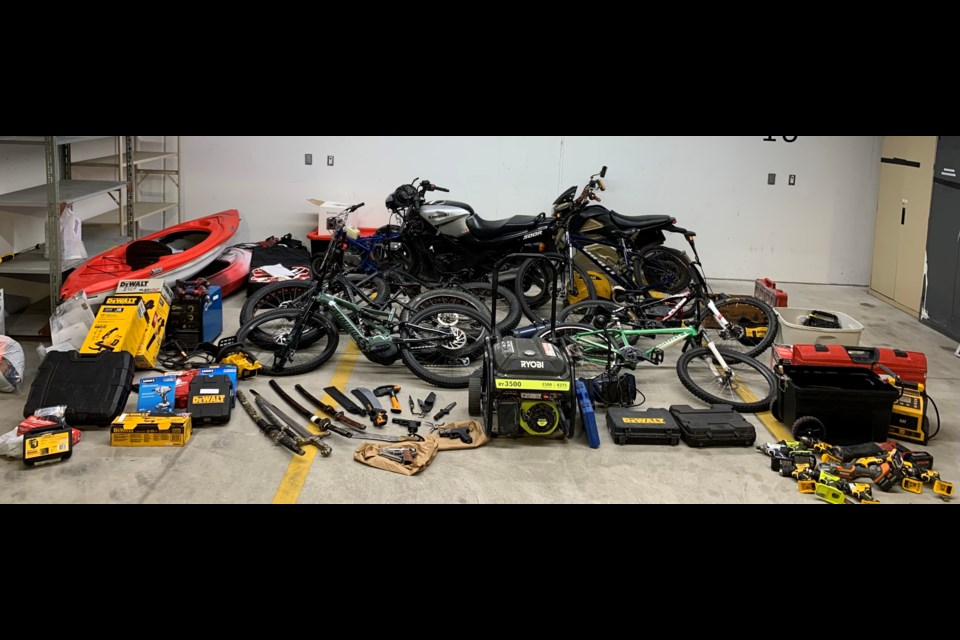 Items recovered during a series of search warrants being executed Wednesday in Guelph and Waterloo Region.