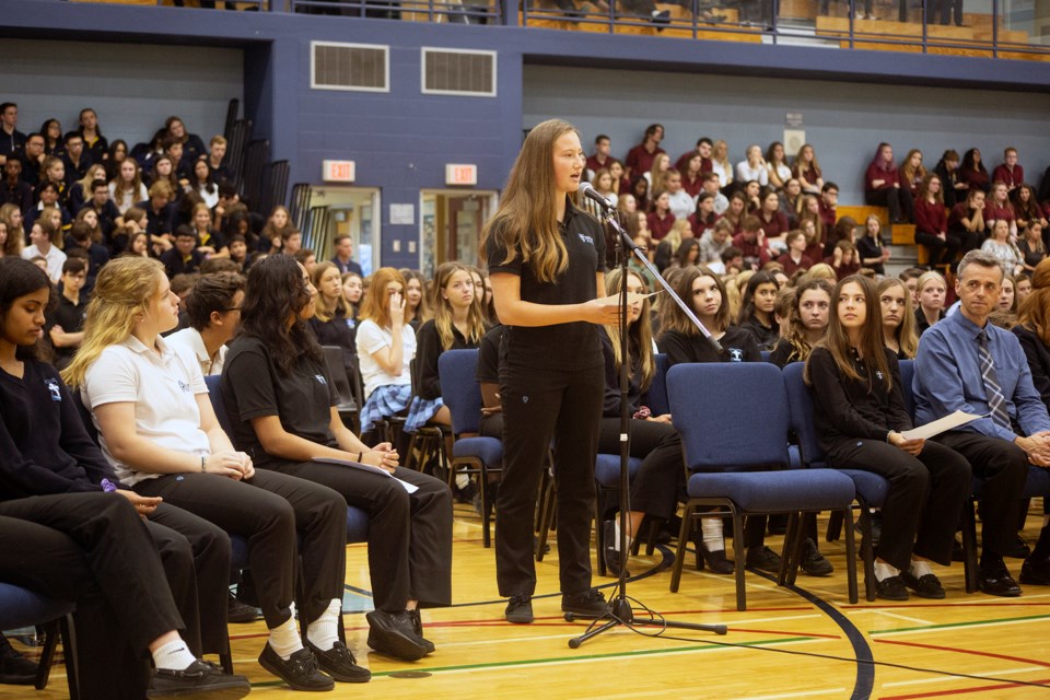 Christina Alexander, a Grade 10 student at Bishop Mac, asks a question to candidates during an event at the school on Tuesday. Kenneth Armstrong/GuelphToday