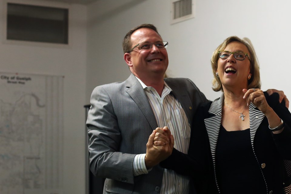 Mike Schreiner, leader of the Green Party of Ontario, embraces Green Party of Canada leader Elizabeth May at the opening of Schreiner's campaign office Tuesday. Kenneth Armstrong/GuelphToday