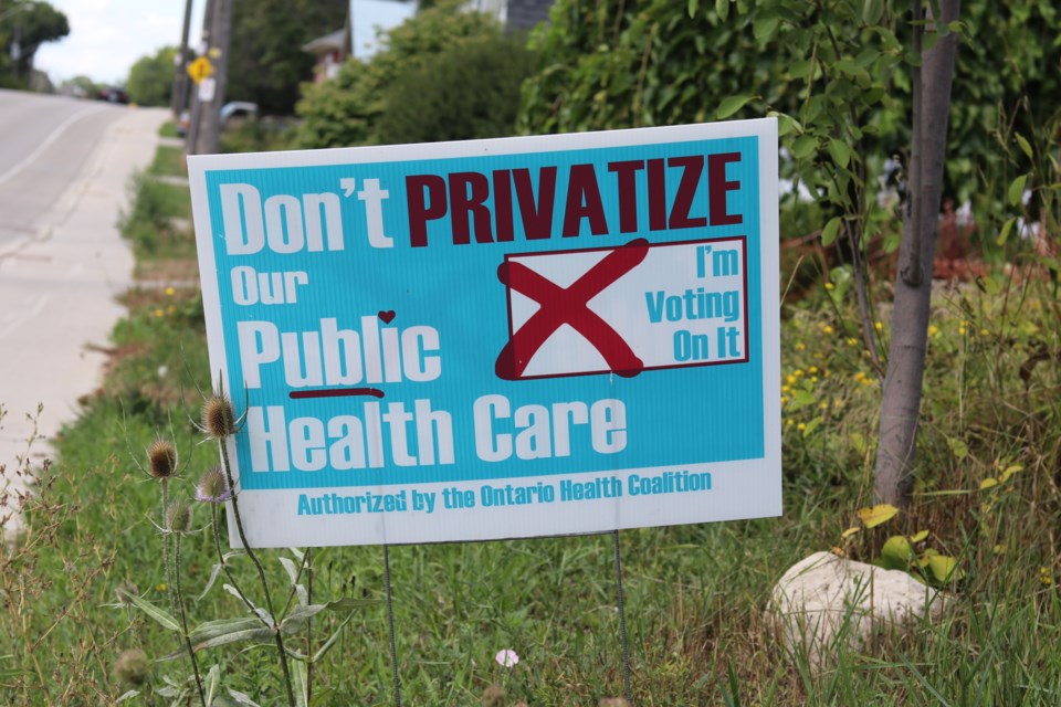Signs can be spotted around the city saying "no" to private healthcare. 
