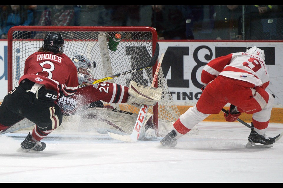 Zac Senyshyn of the Sault Ste. Marie Greyhounds scores on the Guelph Storm's Liam Herbst Friday, March 3, 2017, at the Sleeman Centre. Tony Saxon/GuelphToday