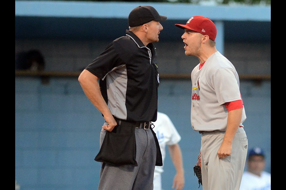 Hamilton Cardinals pitcher Kyle Adoranti argues with the home plate umpire during a 7-6 loss to the Guelph Royals at Hastings Stadium Saturday, July 16, 2016. Tony Saxon/GuelphToday