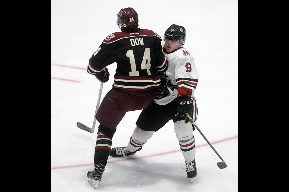 Bobby Dow of the Peterborough Petes was called for a penalty on this hit on the Guelph Storm's Barret Kirwin Saturday, Sept. 16, 2017. Tony Saxon/GuelphToday