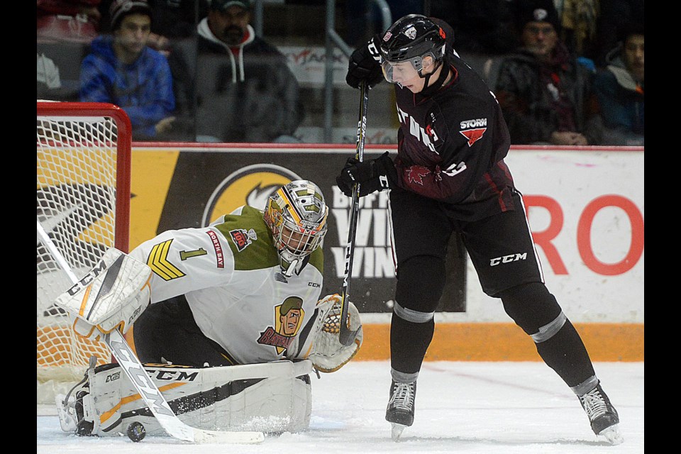 Isaac Ratcliffe of the Guelph Storm tries to tip the puck past North Bay Battalion goaltender Julian Simes Friday, Nov. 10, 2017, at the Sleeman Centre. Tony Saxon/GuelphToday