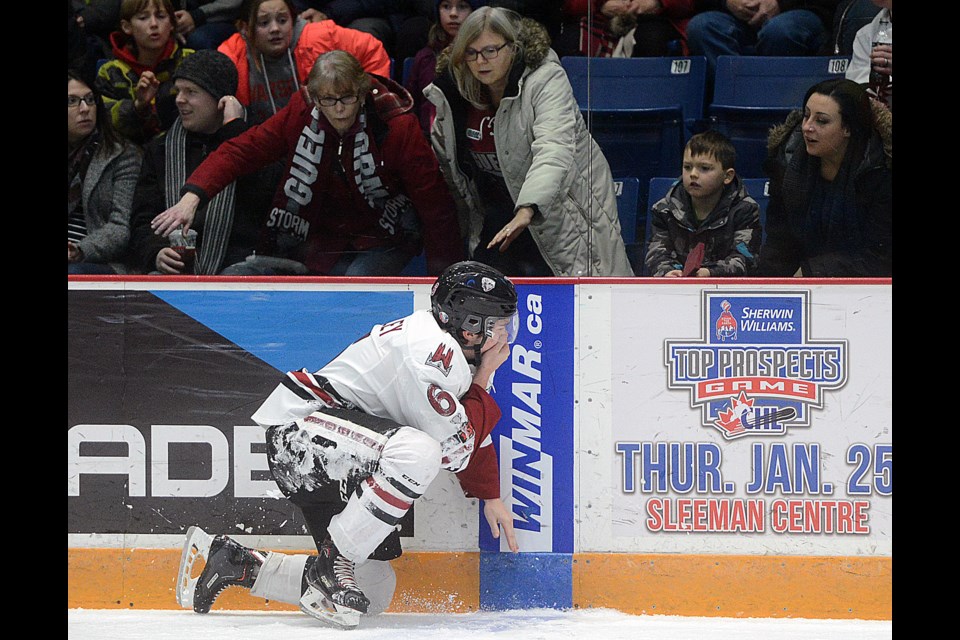 Fans check on the well being of the Guelph Storm's Ryan Merkley after a high stick Friday, Dec. 15, 2017, against the Kingston Frontenacs at the Sleeman Centre. Tony Saxon/GuelphToday
