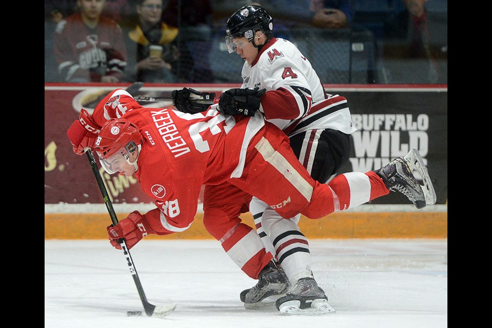Hayden Verbeek of the Saut Ste. Marie Greyhounds is upended by Owen Lalonde of the Guelph Storm Saturday, Dec. 16, 2017, at the Sleeman Centre. Tony Saxon/GuelphToday
