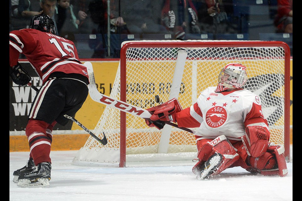 Soo Greyhounds goalender Matthew Villalta makes a save on the Guelph Storm's Liam Hawel Sunday, Jan. 7, 2018, at the Sleeman Centre. Tony Saxon/GuelphToday