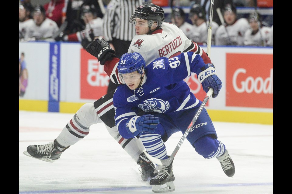 Tag Bertuzzi is checked by the Mississauga Steelheads Mathieu Forget Thursday, Feb. 1, 2018, at the Hershey Centre. Tony Saxon/GuelphToday