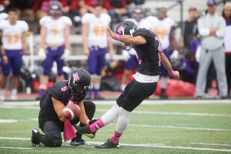 Gryphons kicker Gabriel Ferraro makes a field goal attempt during Saturday's game against the Wilfred Laurier Golden Hawks at Alumni Stadium in Guelph. Kenneth Armstrong/GuelphToday
