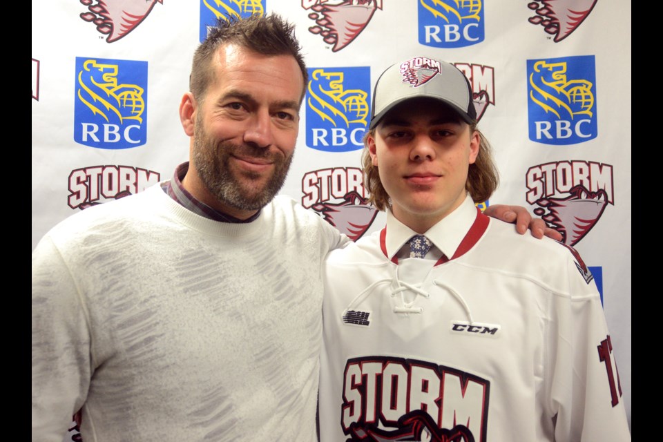 Todd and Tag Bertuzzi pose for a photo at the Guelph Holiday Inn shortly after the Storm selected Tag with their first pick in the OHL Priority Selection Draft on Saturday, April 8, 2017. Tony Saxon/GuelphToday