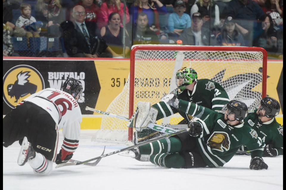 Nate Schnarr fires home the winning goal in overtime Sunday at the Sleeman Centre. Tony Saxon/GuelphToday