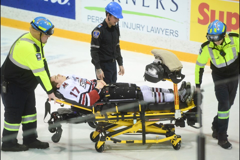 Guelph Storm forward Pavel Gogolev is taken off the ice on a stretcher to be taken to hospital for x-rays on his leg Wednesday in Owen Sound. Tony Saxon/GuelphToday
