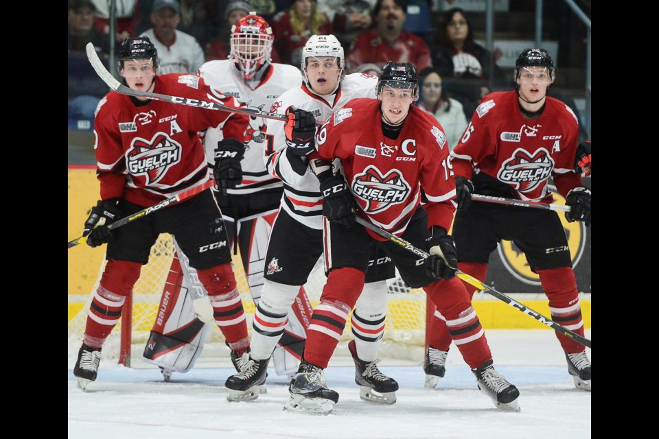 WIth the clock running down, the Guelph Storm crowds the front of the NIagara IceDogs net Sunday at the Sleeman Centre. Tony Saxon/GuelphToday