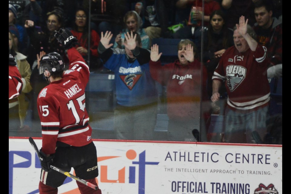 Liam Hawel and friends celebrate Hawel's second goal of the game Friday at the Sleeman Centre. Tony Saxon/GuelphToday