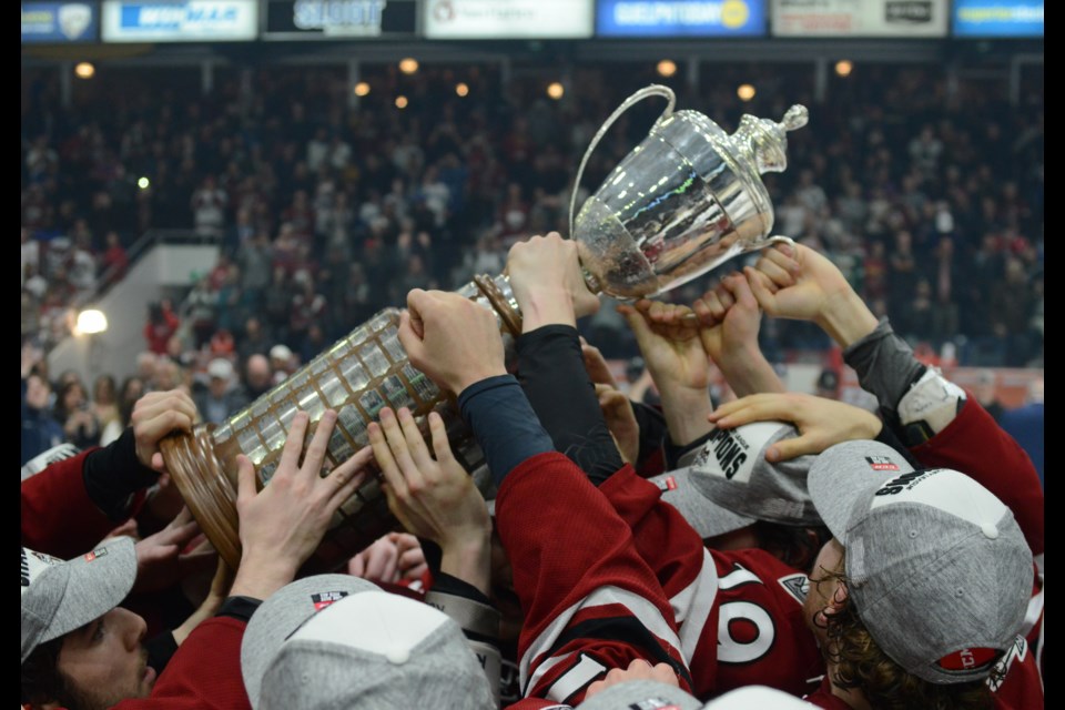 Players hoist the trophy. Tony Saxon/GuelphToday