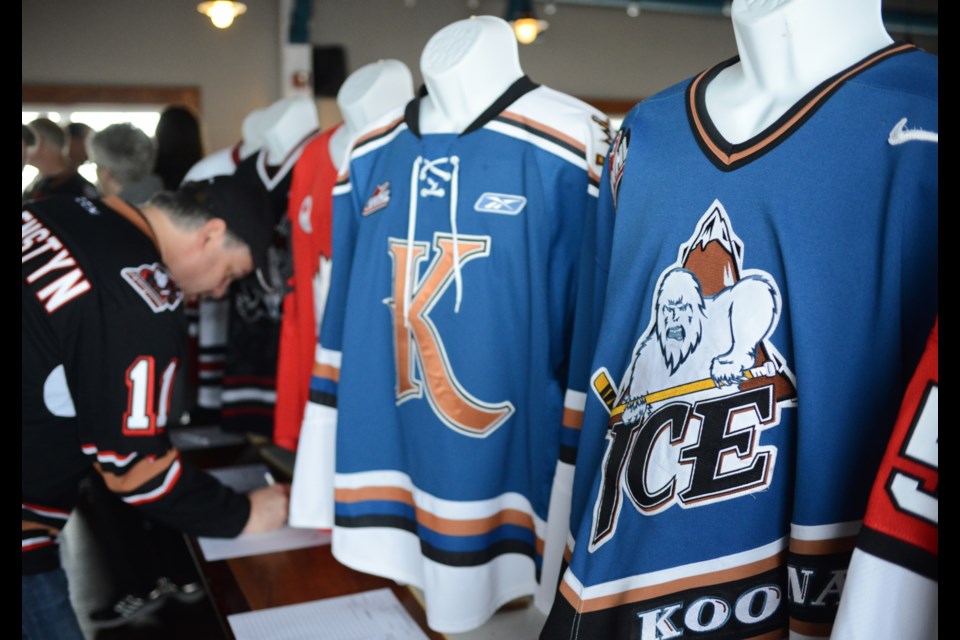 Bidding on some sweet jerseys at the annual Memorial Cup Fan Breakfast Sunday in Halifax. Tony Saxon/GuelphToday