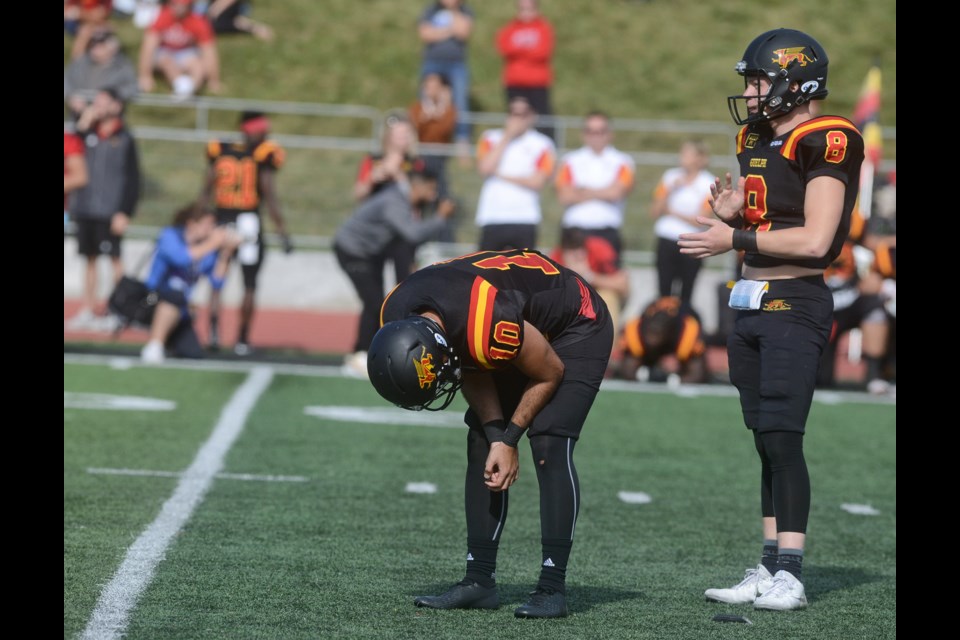 Guelph Gryphon kicker Gabe Ferraro hangs his head after missing a field goal in the dying seconds Saturday at Alumni Stadium that would have given his team the lead. Tony Saxon/GuelphToday