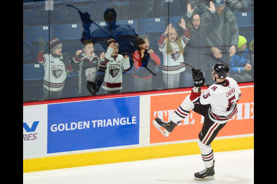 Daniil Chayka celebrates his game-winning goal in overtime with some fans Friday night at the Sleeman Centre. Tony Saxon/GuelphToday
