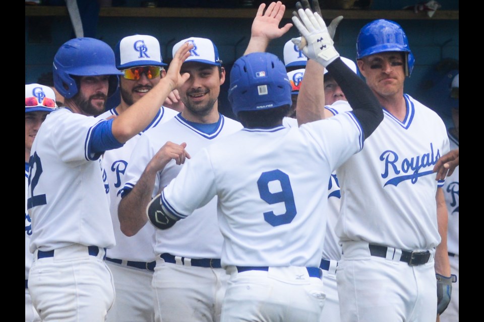 J.D. Williams of the Guelph Royals is congratulated by teammates after leading off the game with a home run on May 28, 2022, at Hastings Stadium against the Brantford Red Sox.