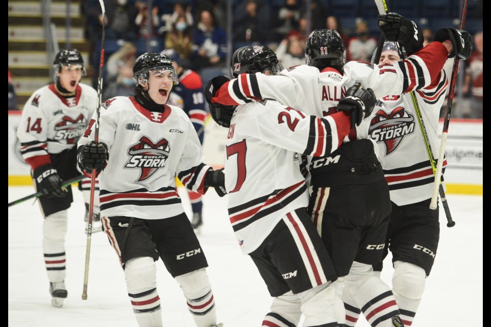 Guelph Storm players congratulate  Cam Allen on his second period goal Friday at the Sleeman Centre.