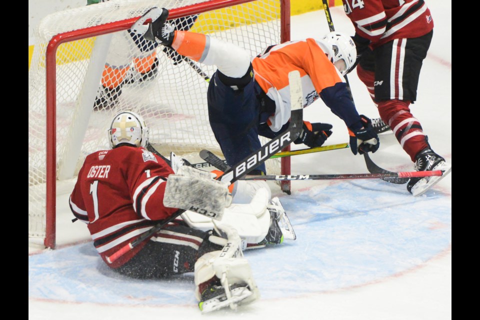 Flint's Riley Piercey scores the winner in overtime at the Sleeman Centre Tuesday.