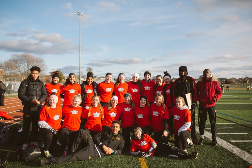 The current 2021-2022 Guelph Women's Football Team taken at the 2021 7v7 Women's Flag Football Kickoff Tournament in November 2021.