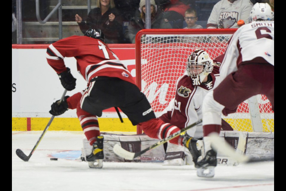 The Guelph Storm's Braeden Bowman makes a move to score on Peterborough Petes goaltender Michael Simpson Friday at the Sleeman Centre.