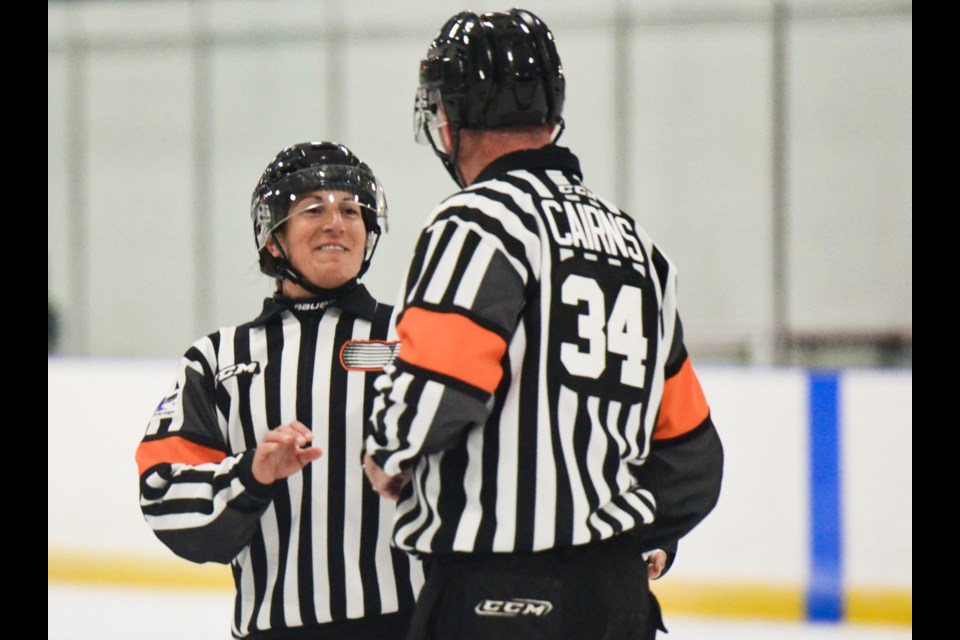Lacey Senuk became the first female to referee an OHL game in Mississauga Friday night.